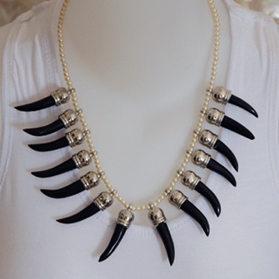 necklace art cutting with horn cow shell
