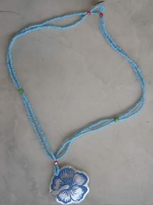 green turbo cut polish necklace