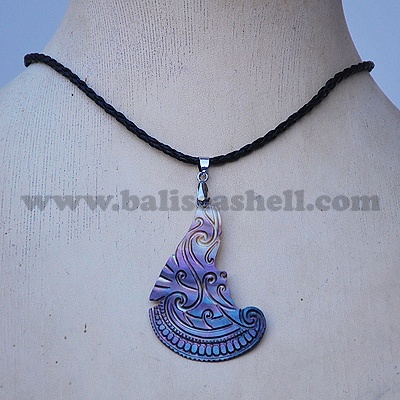 tahitian art tatoo style carving shell