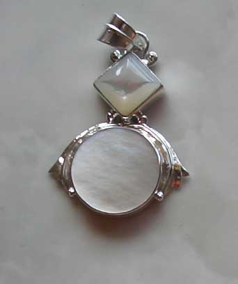 Silver Pendant Art Carved Mop Shell